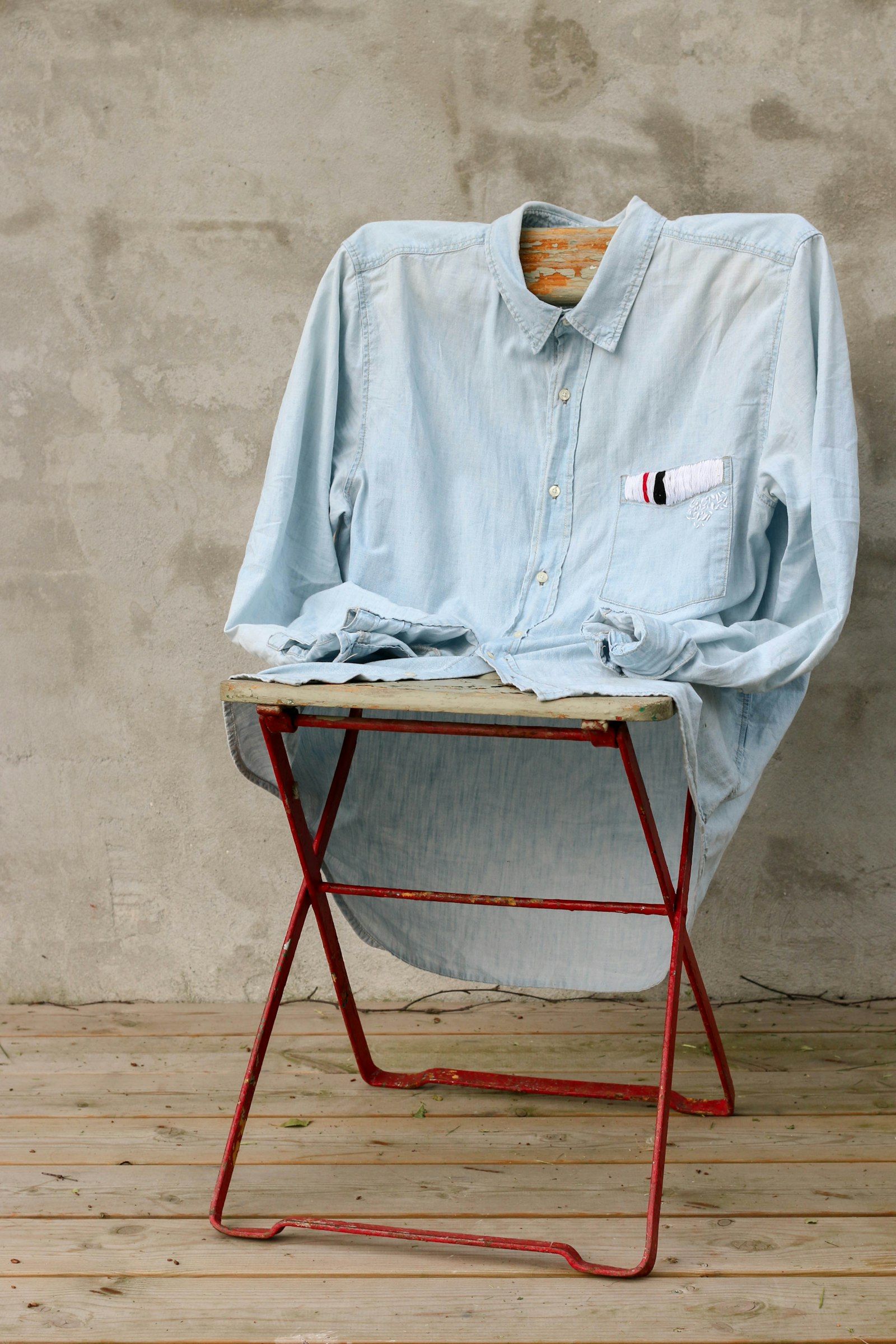 Folded woollen textiles in warm natural tones