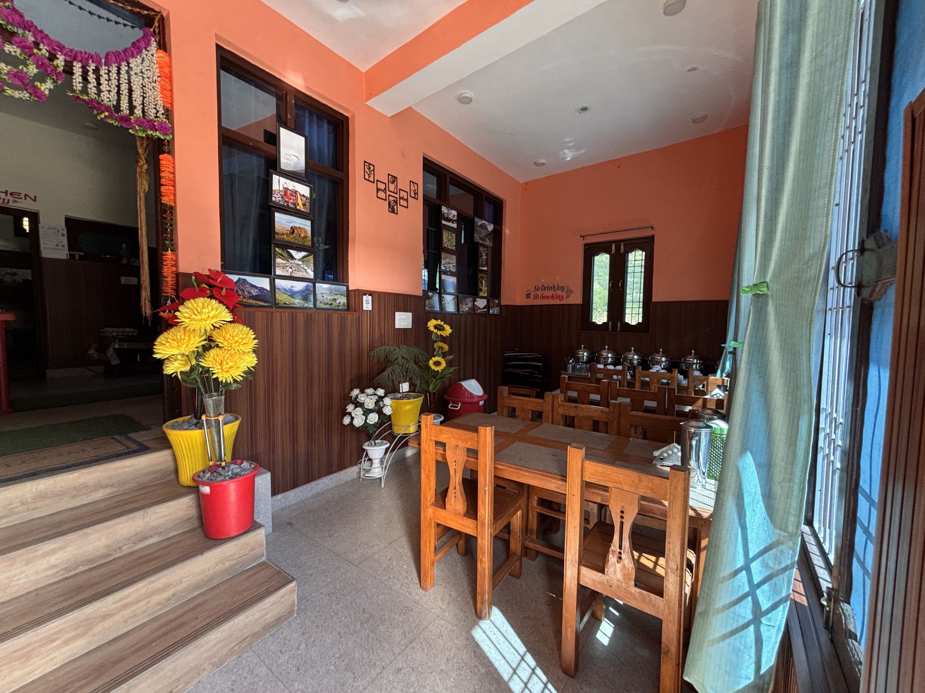 The dining room with wooden tables