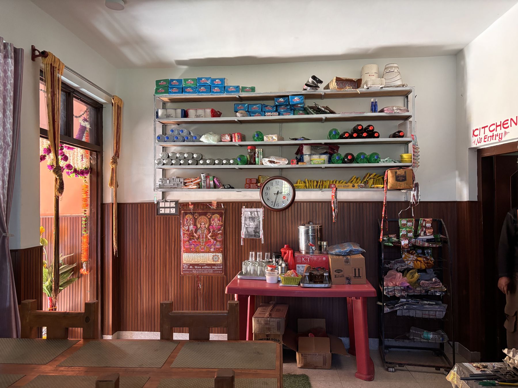 Shelves of the village shop in front of the homestay